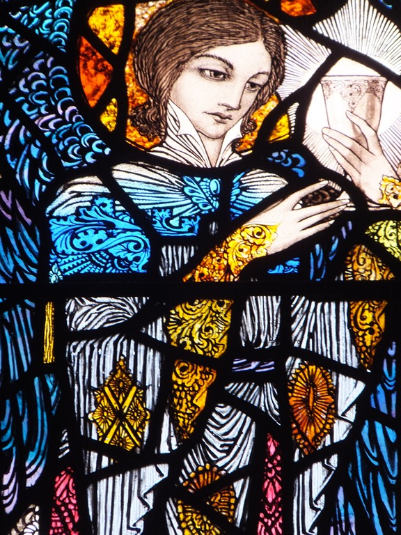 Harry Clarke stained glass window of the angel in the Garden of Gethsemane holding cup