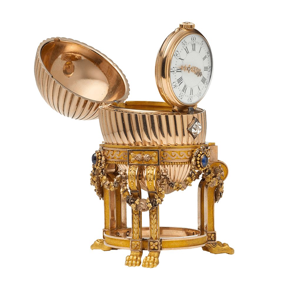 Hand-carved golden Faberge Egg with clock