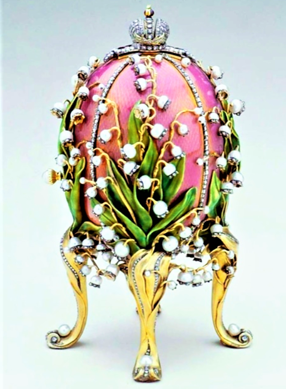 ornate Faberge egg with pink enamel and white lily flowers