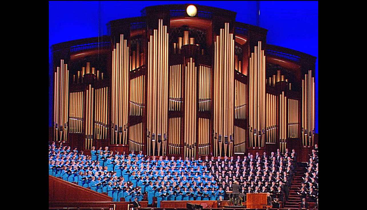 Mormon Tabernacle Choir with women dressed in blue and pipes in background
