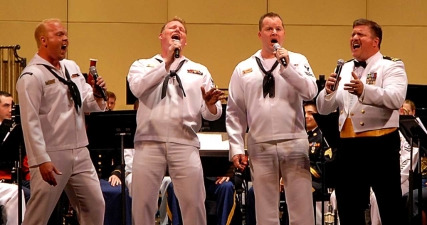 four sailors singing barbershop