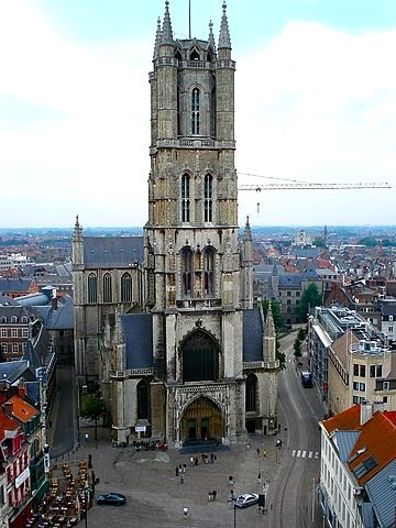 tall cathedral towering over cityscape in Ghent Belgium
